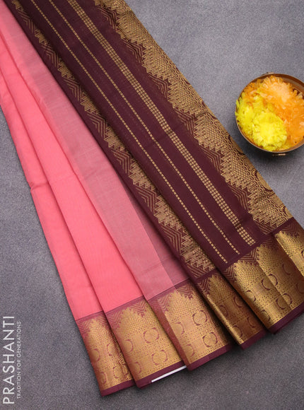 Silk cotton saree peach pink and deep maroon with plain body and temple & rudhraksha zari woven border