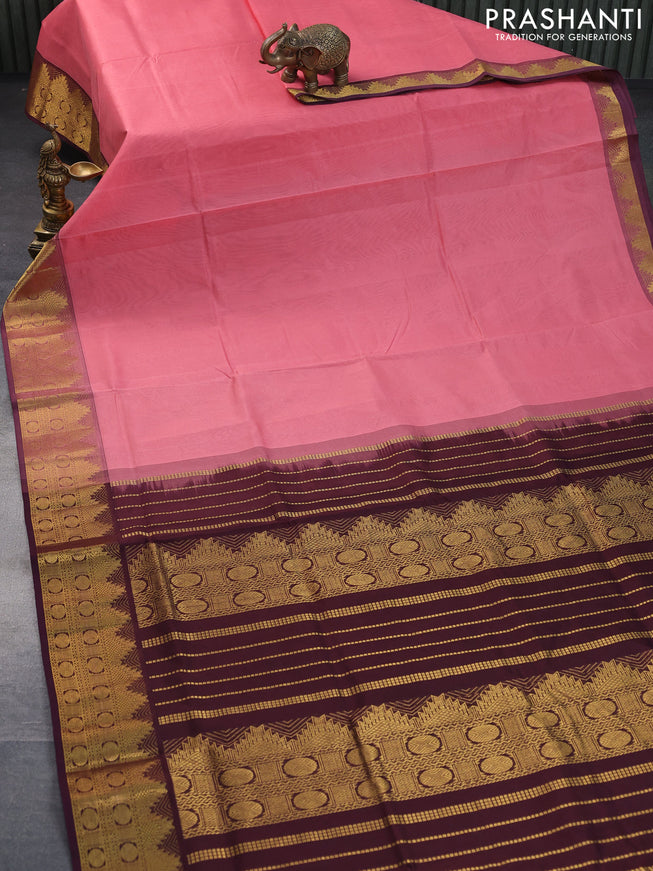 Silk cotton saree peach pink and deep maroon with plain body and temple & rudhraksha zari woven border