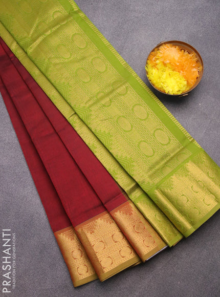 Silk cotton saree maroon and mehendi green with plain body and temple & rudhraksha zari woven border