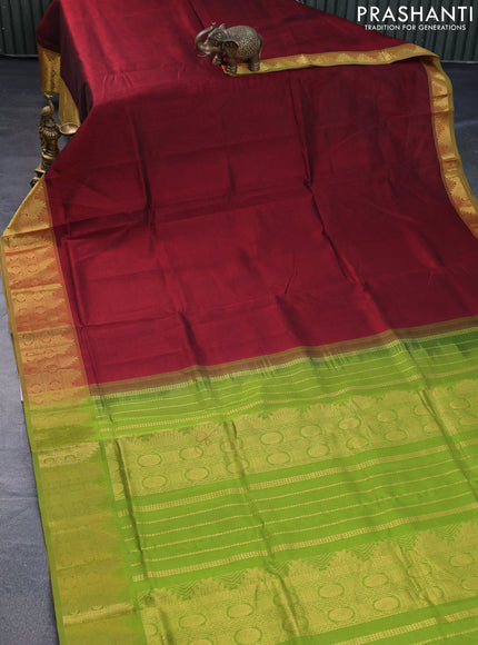 Silk cotton saree maroon and mehendi green with plain body and temple & rudhraksha zari woven border