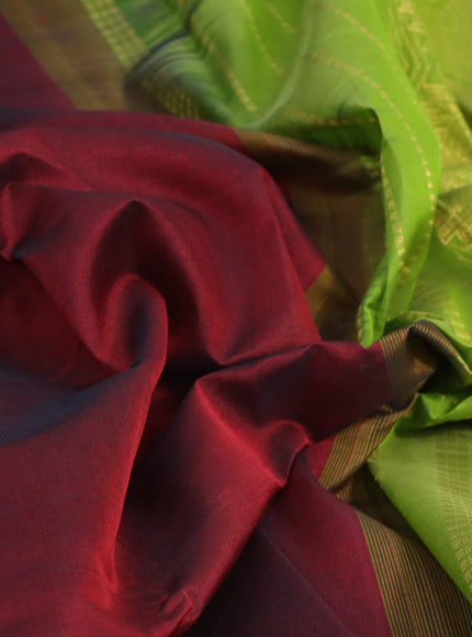 Silk cotton saree maroon and mehendi green with plain body and temple & rudhraksha zari woven border