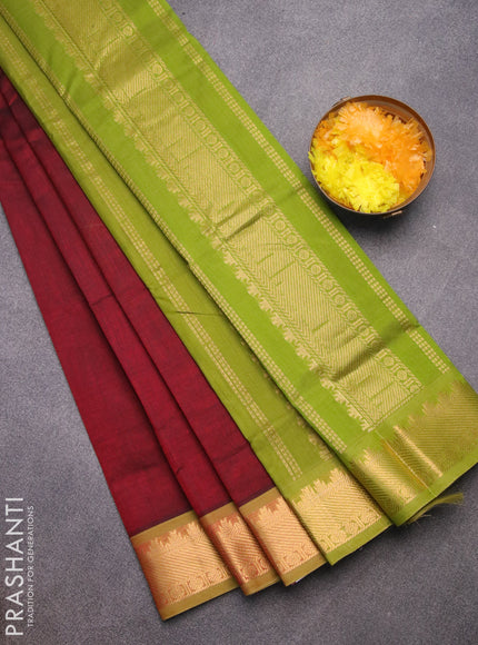 Silk cotton saree maroon and light green with plain body and temple design zari woven border