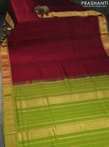 Silk cotton saree maroon and light green with plain body and temple design zari woven border