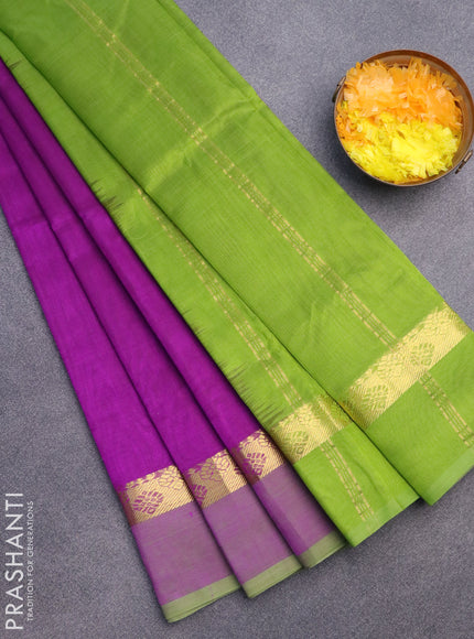 Silk cotton saree purple and light green with plain body and zari woven simple border