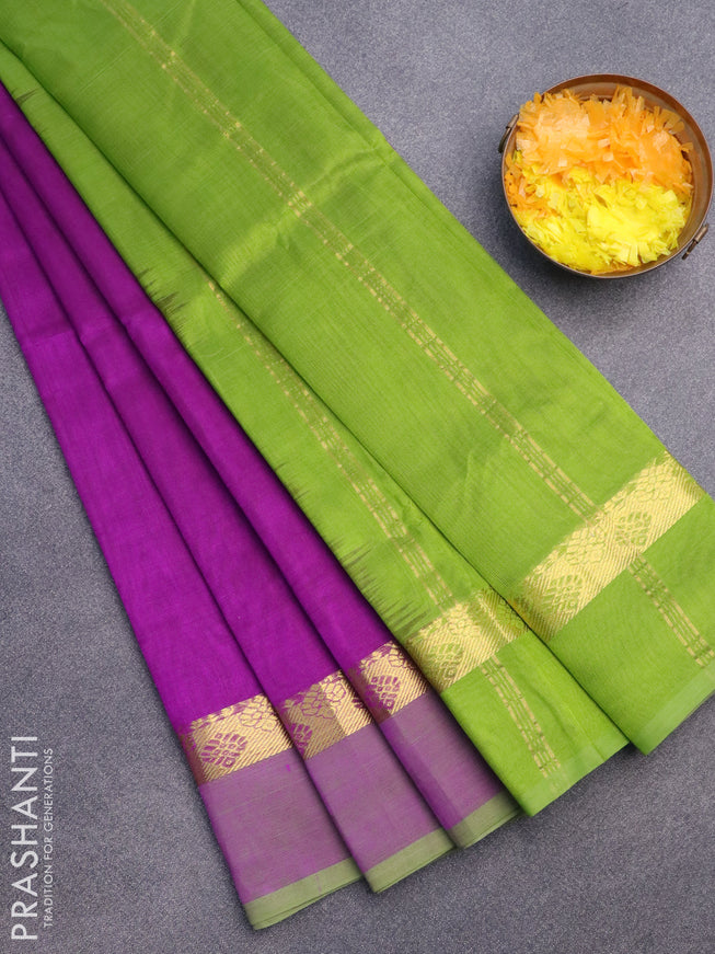 Silk cotton saree purple and light green with plain body and zari woven simple border