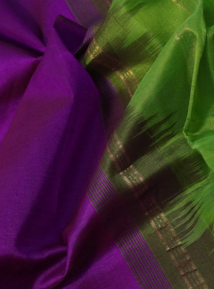 Silk cotton saree purple and light green with plain body and zari woven simple border