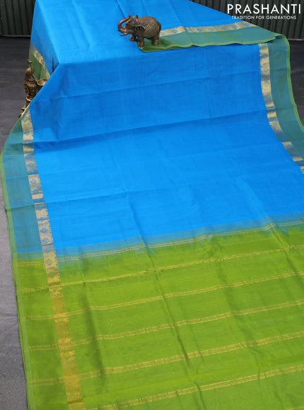 Silk cotton saree cs blue and light green with plain body and zari woven simple border