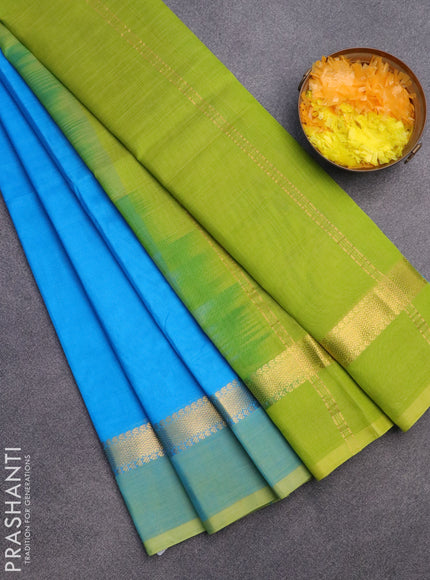 Silk cotton saree light blue and light green with plain body and zari woven simple border