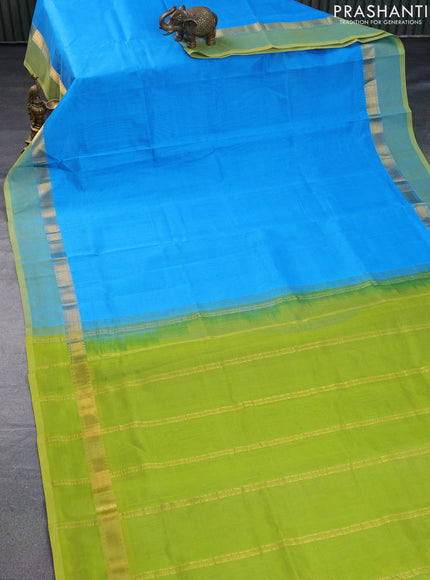 Silk cotton saree light blue and light green with plain body and zari woven simple border