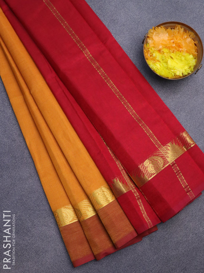 Silk cotton saree mango yellow and maroon with plain body and tenple & paisley zari woven simple border