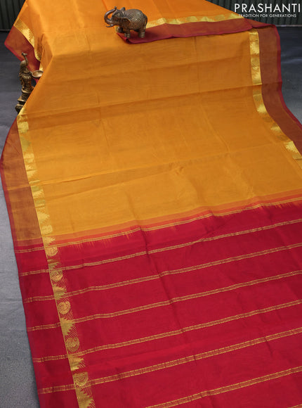 Silk cotton saree mango yellow and maroon with plain body and tenple & paisley zari woven simple border