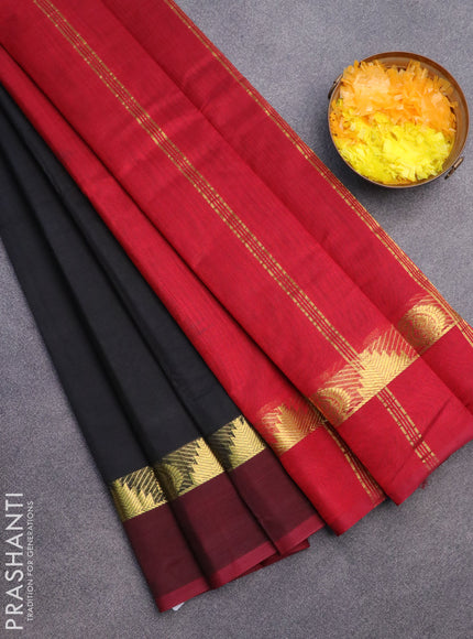 Silk cotton saree black and maroon with plain body and tenple & paisley zari woven simple border