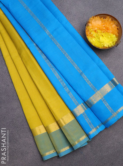 Silk cotton saree lime yellow and cs blue with plain body and rettapet zari woven border