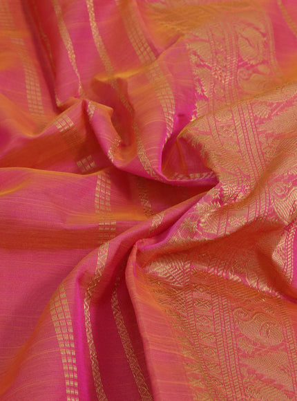 Silk cotton saree dual shade of pinkish orange with plain body and rettapet zari woven border