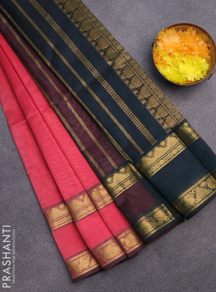 Silk cotton saree peach pink and bottle green with plain body and rettapet zari woven border