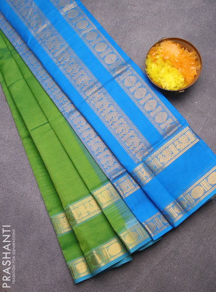 Silk cotton saree light green and cs blue with plain body and rettapet zari woven border