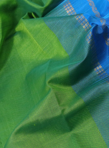 Silk cotton saree light green and cs blue with plain body and rettapet zari woven border