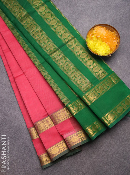 Silk cotton saree peach pink and green with plain body and rettapet zari woven border