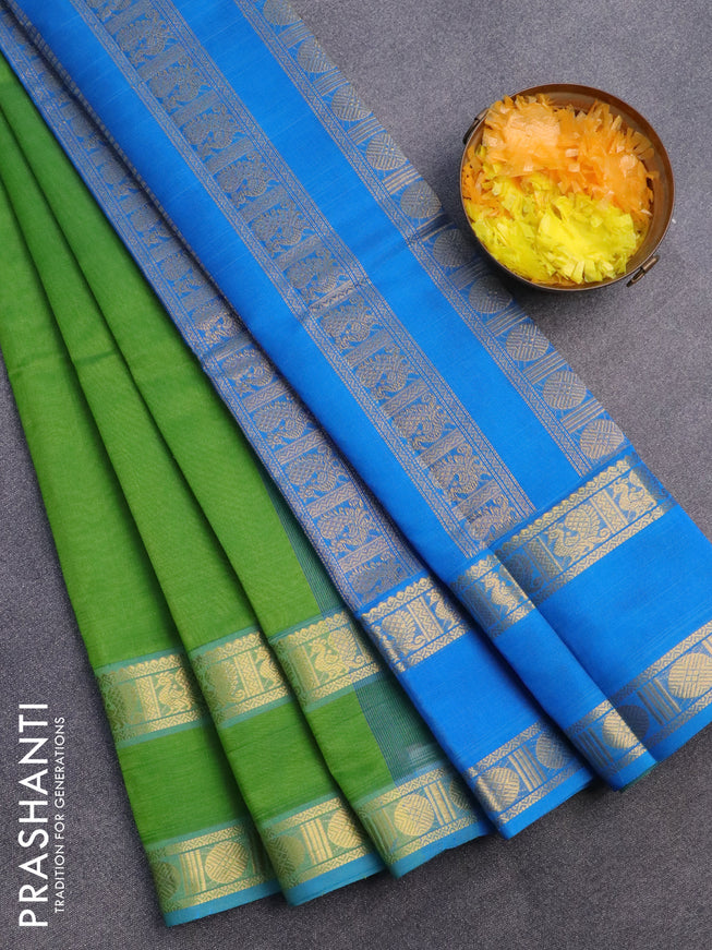 Silk cotton saree light green and cs blue with plain body and rettapet zari woven border