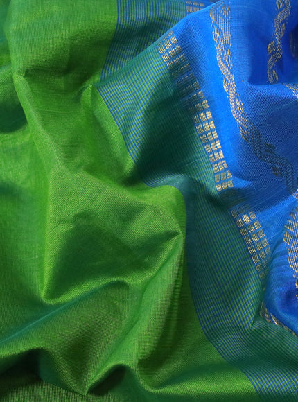 Silk cotton saree light green and cs blue with plain body and rettapet zari woven border