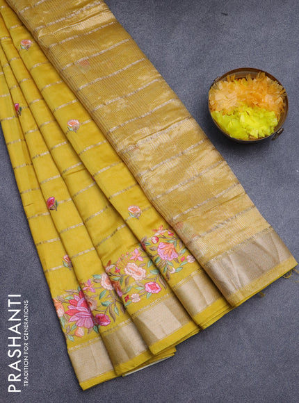 Assam silk saree mustard yellow with allover zari weaves & embroidery work buttas and floral design embroidery work zari border