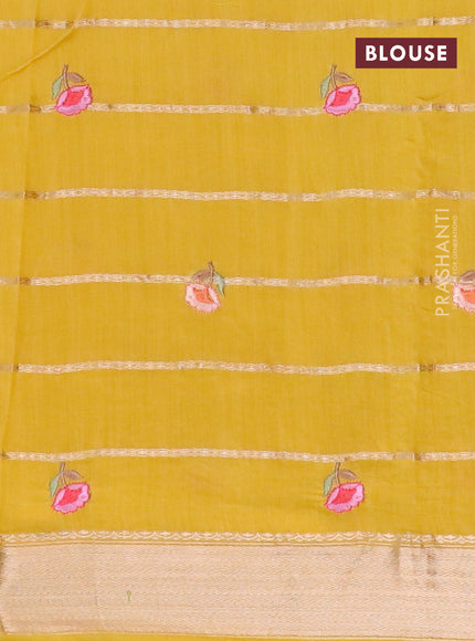 Assam silk saree mustard yellow with allover zari weaves & embroidery work buttas and floral design embroidery work zari border