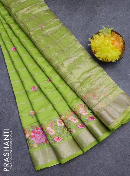 Assam silk saree fluorescent green with allover zari weaves & embroidery work buttas and floral design embroidery work zari border