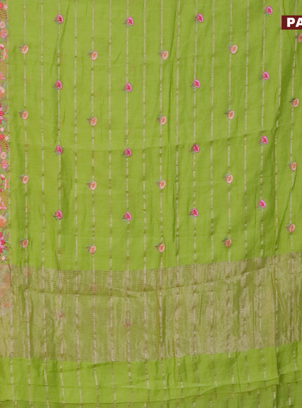 Assam silk saree fluorescent green with allover zari weaves & embroidery work buttas and floral design embroidery work zari border