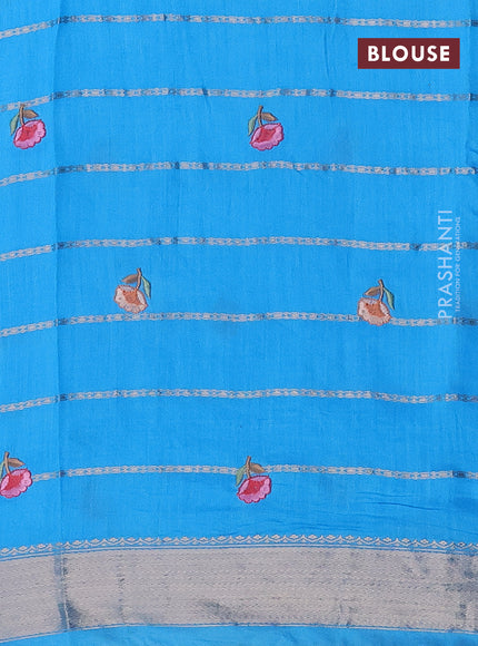 Assam silk saree light blue with allover zari weaves & embroidery work buttas and floral design embroidery work zari border