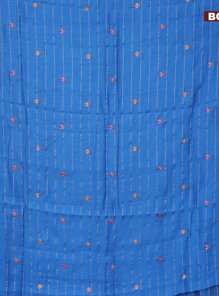 Assam silk saree cs blue with allover zari weaves & embroidery work buttas and floral design embroidery work zari border