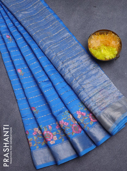 Assam silk saree blue with allover zari weaves & embroidery work buttas and floral design embroidery work zari border