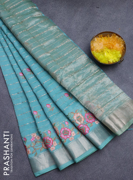 Assam silk saree pastel green shade with allover zari weaves & embroidery work buttas and floral design embroidery work zari border