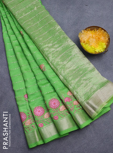 Assam silk saree parrot green with allover zari weaves & embroidery work buttas and floral design embroidery work zari border