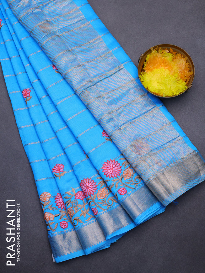 Assam silk saree cs blue with allover zari weaves & embroidery work buttas and floral design embroidery work zari border