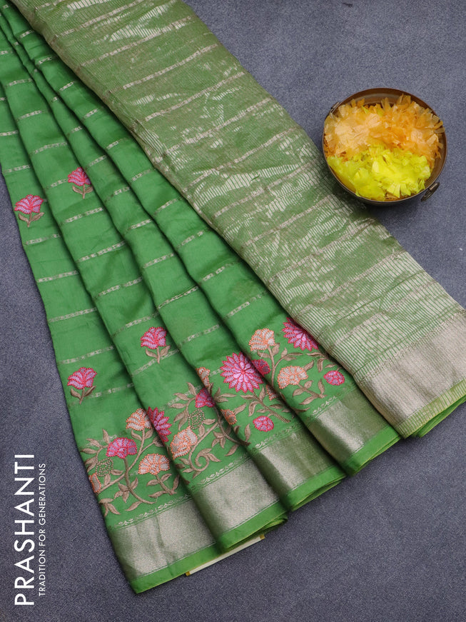 Assam silk saree green with allover zari weaves & embroidery work buttas and floral design embroidery work zari border