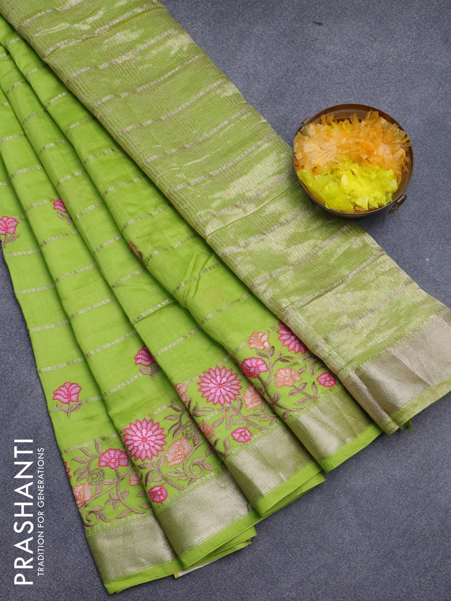 Assam silk saree fluorescent green with allover zari weaves & embroidery work buttas and floral design embroidery work zari border