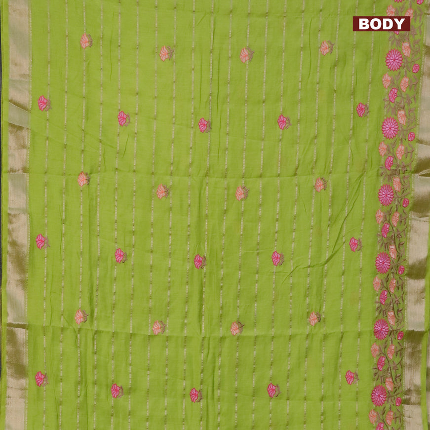 Assam silk saree fluorescent green with allover zari weaves & embroidery work buttas and floral design embroidery work zari border