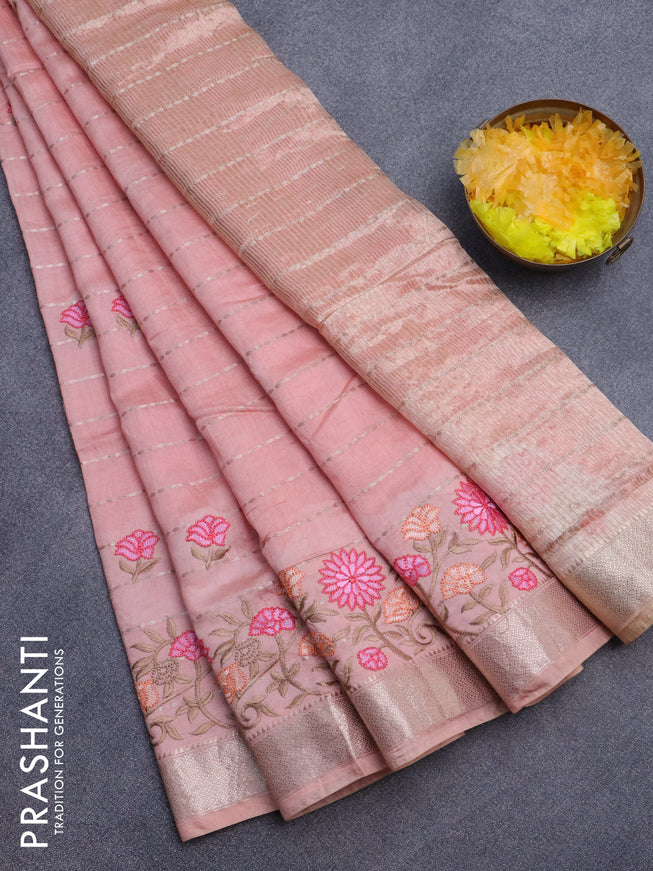 Assam silk saree mild peach with allover zari weaves & embroidery work buttas and floral design embroidery work zari border