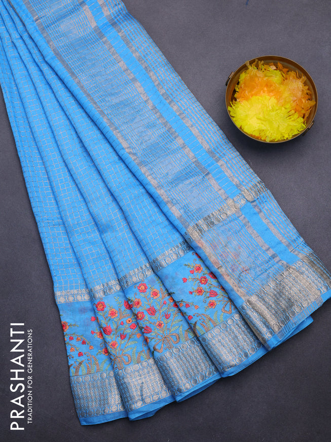 Assam silk saree light blue with allover zari checked pattern and floral design embroidery work zari border