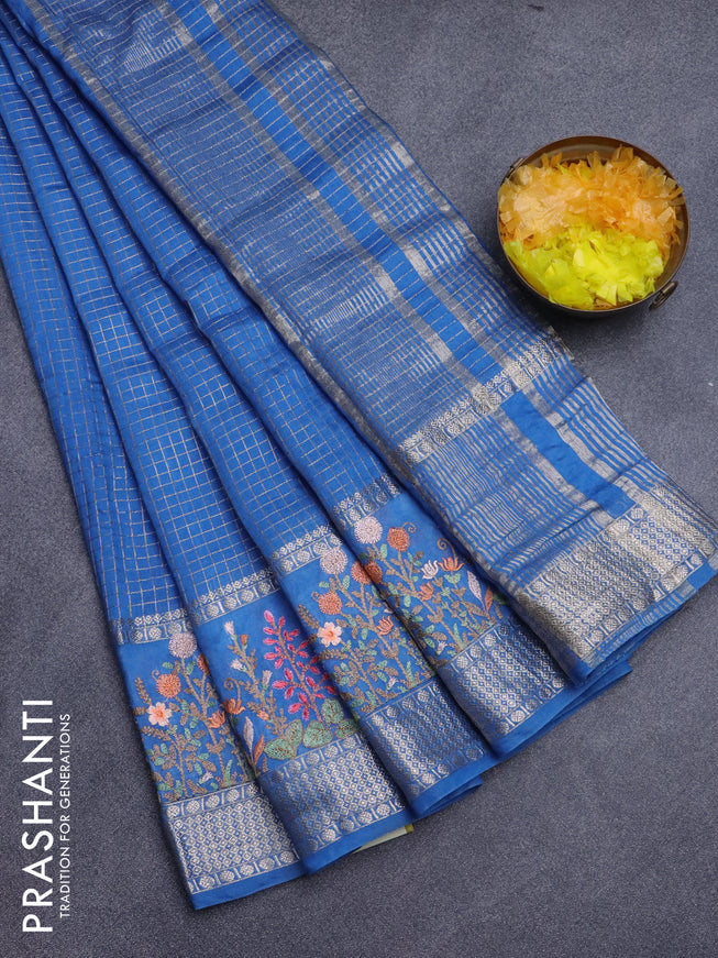 Assam silk saree cs blue with allover zari checked pattern and floral design embroidery work zari border