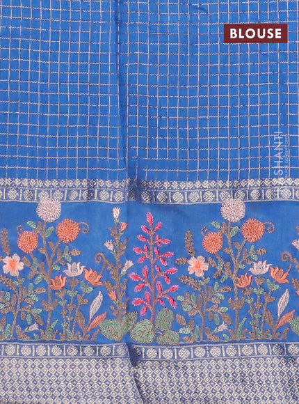 Assam silk saree cs blue with allover zari checked pattern and floral design embroidery work zari border