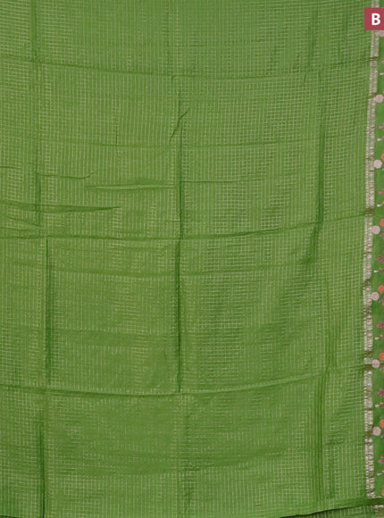 Assam silk saree light green with allover zari checked pattern and floral design embroidery work zari border