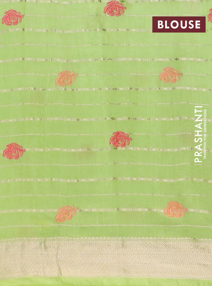 Assam silk saree fluorescent green with allover zari weaves & embroidery work buttas and zari woven border