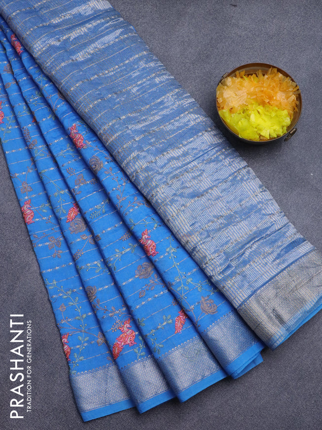 Assam silk saree cs blue with allover zari weaves & embroidery work buttas and zari woven border