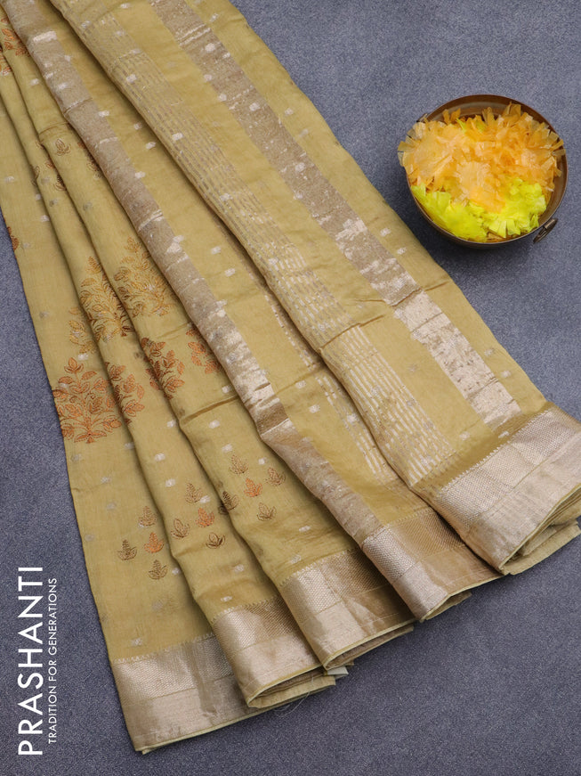 Assam silk saree khaki shade with allover embroidery work & zari buttas and zari woven border