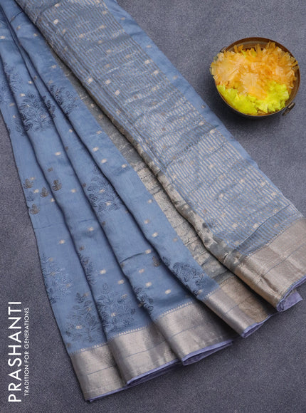 Assam silk saree grey with allover embroidery work & zari buttas and zari woven border