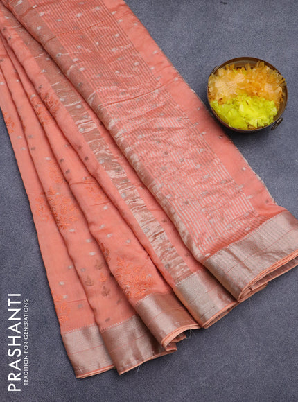 Assam silk saree peach orange with allover embroidery work & zari buttas and zari woven border