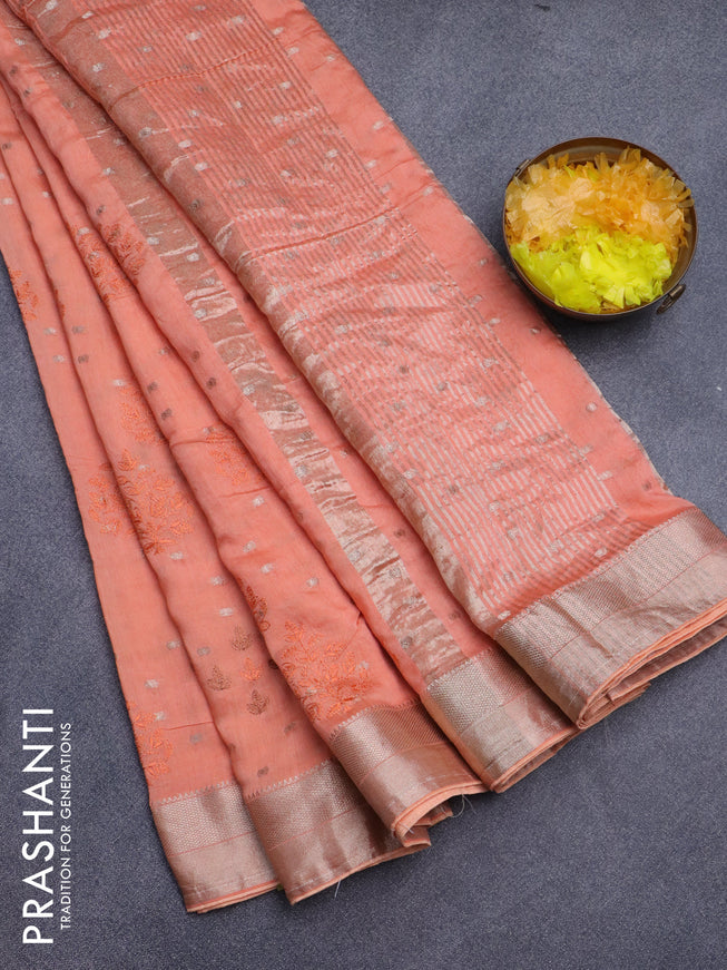 Assam silk saree peach orange with allover embroidery work & zari buttas and zari woven border