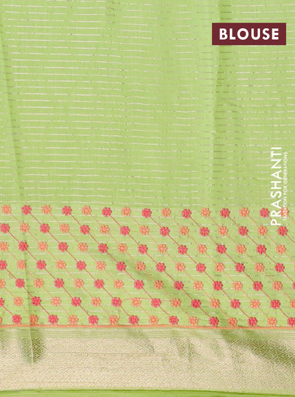 Assam silk saree fluorescent green with allover zari weaves & embroidery work buttas and zari woven border