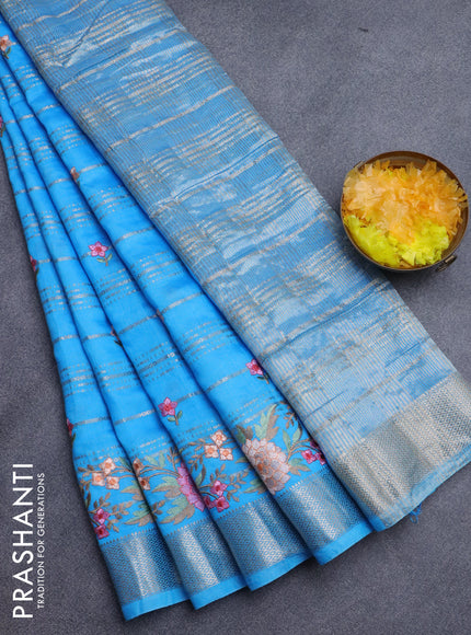 Assam silk saree blue with allover zari weaves & embroidery work buttas and floral design embroidery work zari border